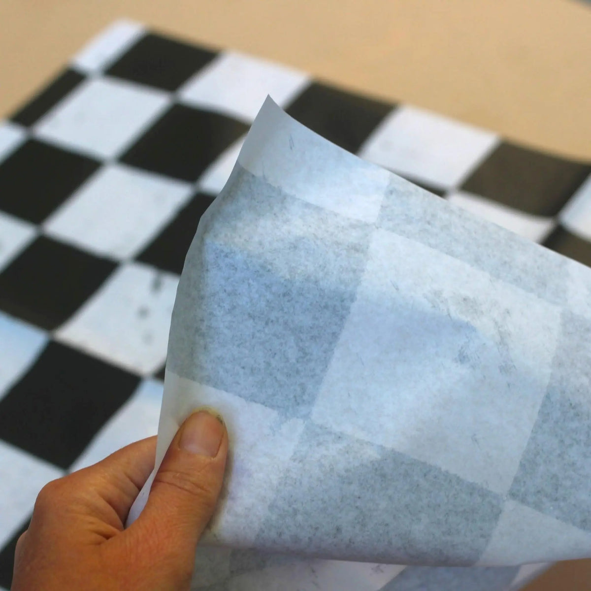 Large Decoupage Paper: Checkerboard Pattern Black and White Upcycling Tissue. Featuring a checkerboard pattern in black and white. Perfect for crafters, decorators, and upcycling enthusiasts, this high-quality tissue paper allows you to effortlessly elevate furniture, home decor, and craft pieces into personalized masterpieces. Whether you're redesigning vintage furniture, creating unique wall art, or embellishing glass and metal surfaces, this versatile decoupage paper is your go-to choice