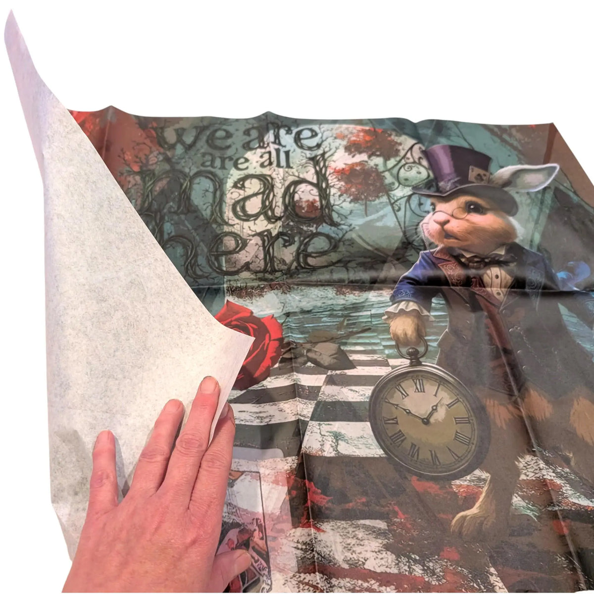 Discover the magic of storytelling with our Alice in Wonderland Decoupage Paper, a vibrant and whimsical addition to your DIY craft supplies. Perfect for adding a touch of fairy core charm to your projects, this high-quality tissue paper features detailed and colorful designs inspired by Lewis Carroll’s beloved characters and scenes. Whether you're creating whimsical home decor, themed party decorations, or unique craft pieces, this decoupage paper brings a splash of fantasy to every project.