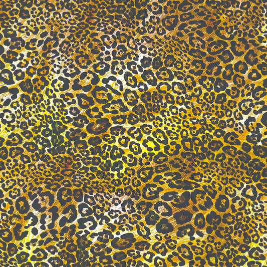A close-up leopard print pattern with dense black and dark gray spots over a warm golden yellow and tan background.