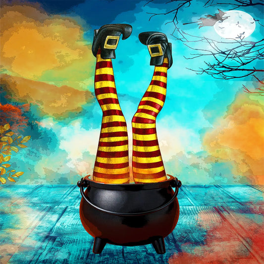 A Halloween-themed decoupage  paper showing a pair of legs wearing red and yellow striped tights and black shoes with gold buckles popping out of a black cauldron, set against a colorful autumn sky with a full moon and bare tree branches