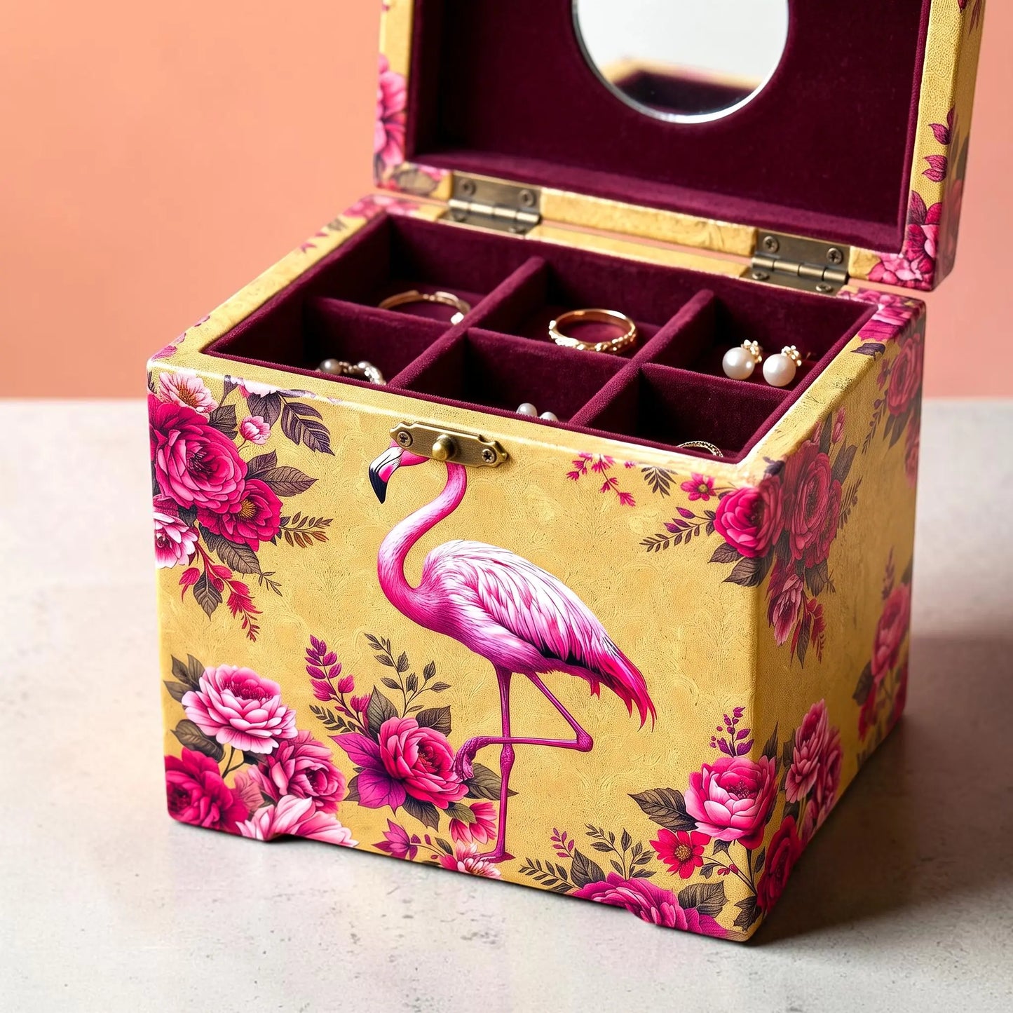 Jewelry box decorated with Decoupage paper with Baroque Ornate  design featuring a floral pattern and a  central pink flamingo standing on one leg, surrounded by large pink and magenta flowers with dark green leaves on a textured gold background.