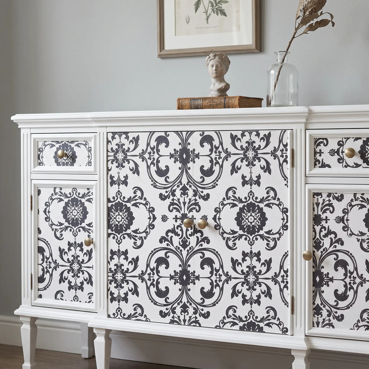 vintage sideboard decorated with decoupage paper