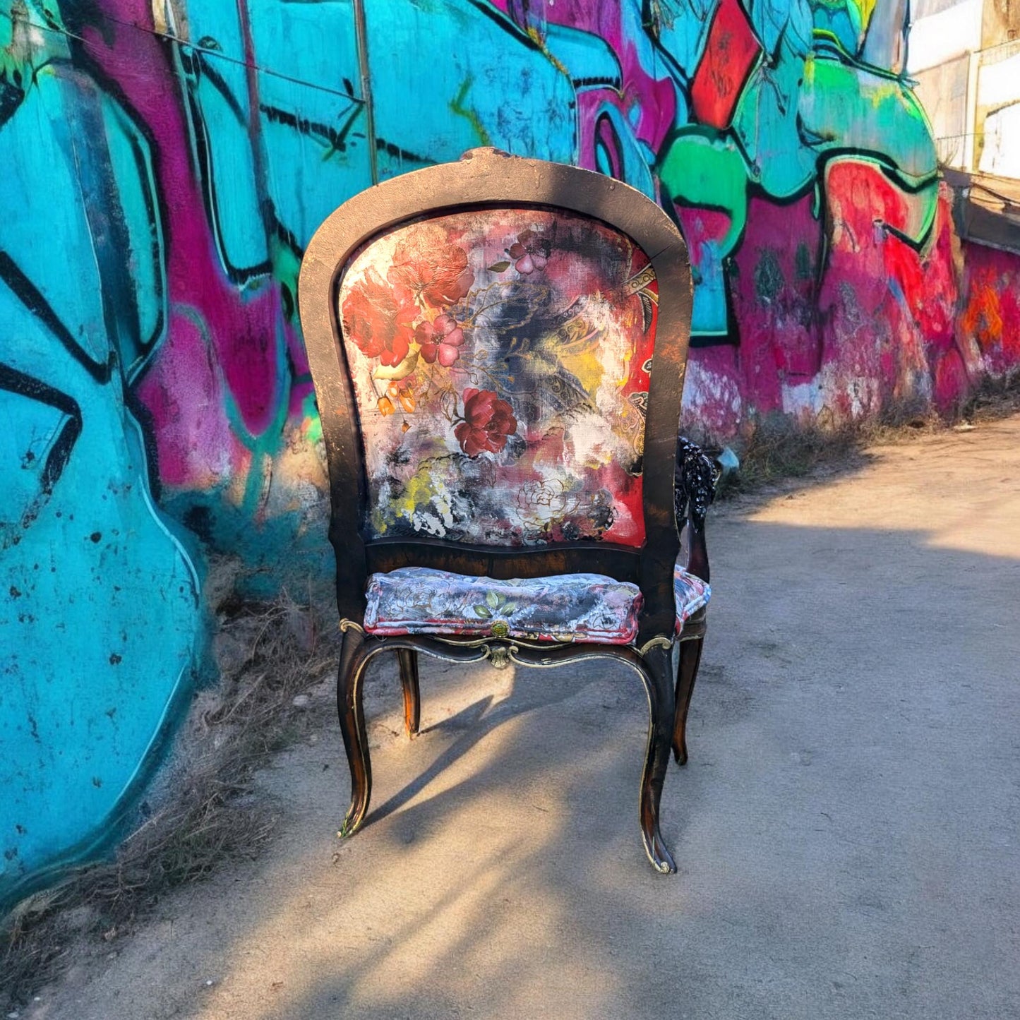 Bring style and character to your home decor with this one-of-a-kind Frida Kahlo vintage French upcycled chair. The chair frame is made of solid wood, painted black, and decorated with gold wax. Chair decsorated with extar large black tassels.