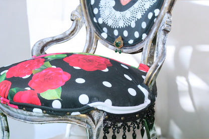 Elevate your living space with this Ruth Bader Ginsburg Accent Chair, a unique upcycled furniture piece that blends artistry and statement-making design. Featuring a striking silhouette and rich, textured upholstery visible in the listing image, this accent chair serves as both a functional seat and a powerful conversation starter. Crafted with care, it honors the legacy of Justice Ginsburg, bringing character and inspiration to your home decor unlike any mass-produced chair.