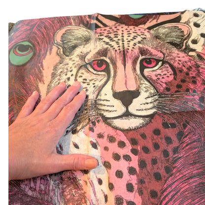 This enchanting decoupage paper features a whimsical pink tiger design that embodies the essence of fairy core aesthetics. With its vibrant hues of soft pinks and delicate accents, the paper showcases the majestic tiger amidst a backdrop of ethereal floral elements and dreamy foliage. Perfect for unique DIY home decor projects, this decoupage paper invites creativity and adds a touch of magical charm to any space. Can use it on furniture, wall art, or craft projects, for an extraordinary piece.