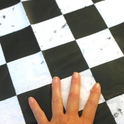 Large Decoupage Paper: Checkerboard Pattern Black and White Upcycling Tissue. Featuring a  checkerboard pattern in  black and white. Perfect for crafters, decorators, and upcycling enthusiasts, this high-quality tissue paper allows you to effortlessly elevate furniture, home decor, and craft pieces into personalized masterpieces. Whether you're redesigning vintage furniture, creating unique wall art, or embellishing glass and metal surfaces, this versatile decoupage paper is your go-to choice