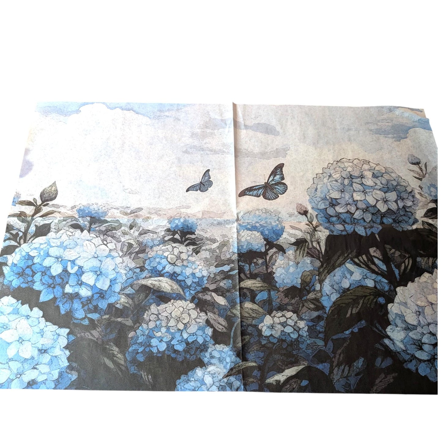 Let your creativity blossom with our "Hydrangea Dream" tissue paper. Measuring 21 inches by 29 inches, this high-quality rice paper is easy to cut, fold, and adhere, making your upcycling projects effortless and enjoyable. Its versatile design complements a variety of styles, from shabby chic to modern boho, adding a touch of nature-inspired elegance to your creations. Perfect for scrapbooking, furniture decals, decoupage techniques, or mixed media art, this decoupage paper is perfect for DIY