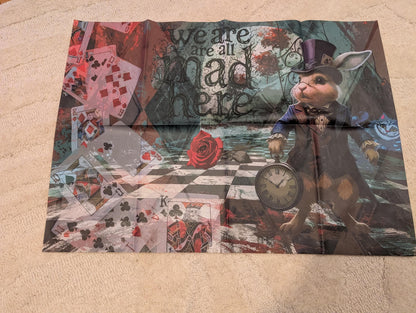 Discover the magic of storytelling with our Alice in Wonderland Decoupage Paper, a vibrant and whimsical addition to your DIY craft supplies. Perfect for adding a touch of fairy core charm to your projects, this high-quality tissue paper features detailed and colorful designs inspired by Lewis Carroll’s beloved characters and scenes. Whether you're creating whimsical home decor, themed party decorations, or unique craft pieces, this decoupage paper brings a splash of fantasy to every project.