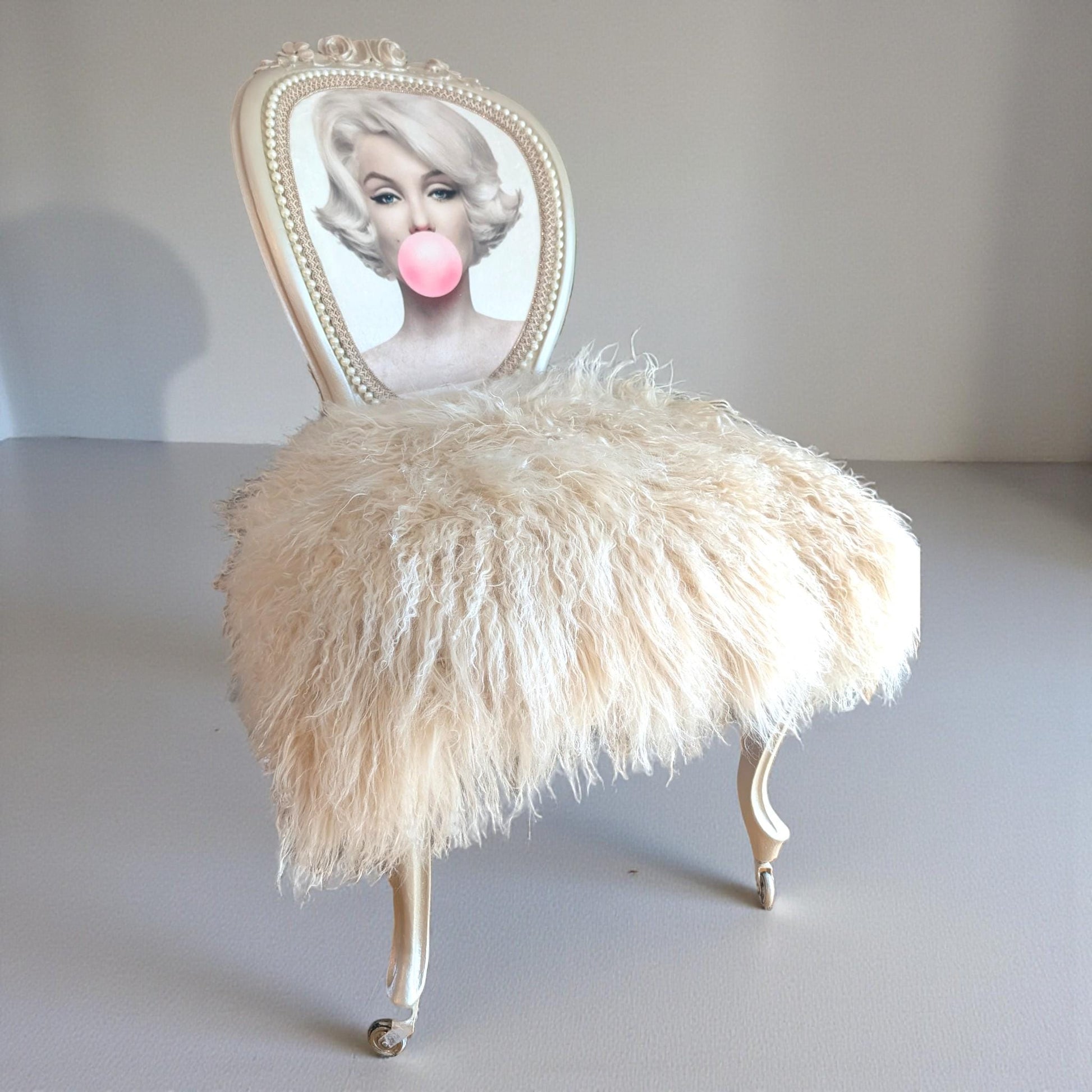 Marilyn Monroe Painted Chair Vintage. Discover the charm of the Marilyn Monroe Painted Chair Vintage Hollywood Decor Pop Art Vanity Accent Unique Bedroom Furniture Statement Piece—a timeless addition that transforms any space with iconic glamour and artistic flair. This chair is more than just seating; it’s a conversation starter and a tribute to classic Hollywood style, designed to stand out in your bedroom or vanity area while offering a distinctive blend of comfort and vintage appeal.