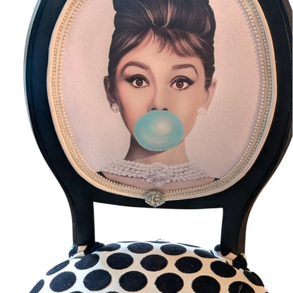 Audrey Hepburn Vanity Chai. Hand-Painted Hollywood Decor. Step into timeless elegance with the Audrey Hepburn Vanity Chair Retro Painted Furniture Pop Art Design Old Hollywood Decor Glamorous Makeup Seat. This uniquely crafted piece combines classic Hollywood charm with vibrant pop art flair, making it a standout addition to your vanity or dressing area. Designed for those who appreciate both style and comfort, this chair offers a nostalgic yet modern touch that elevates any space.