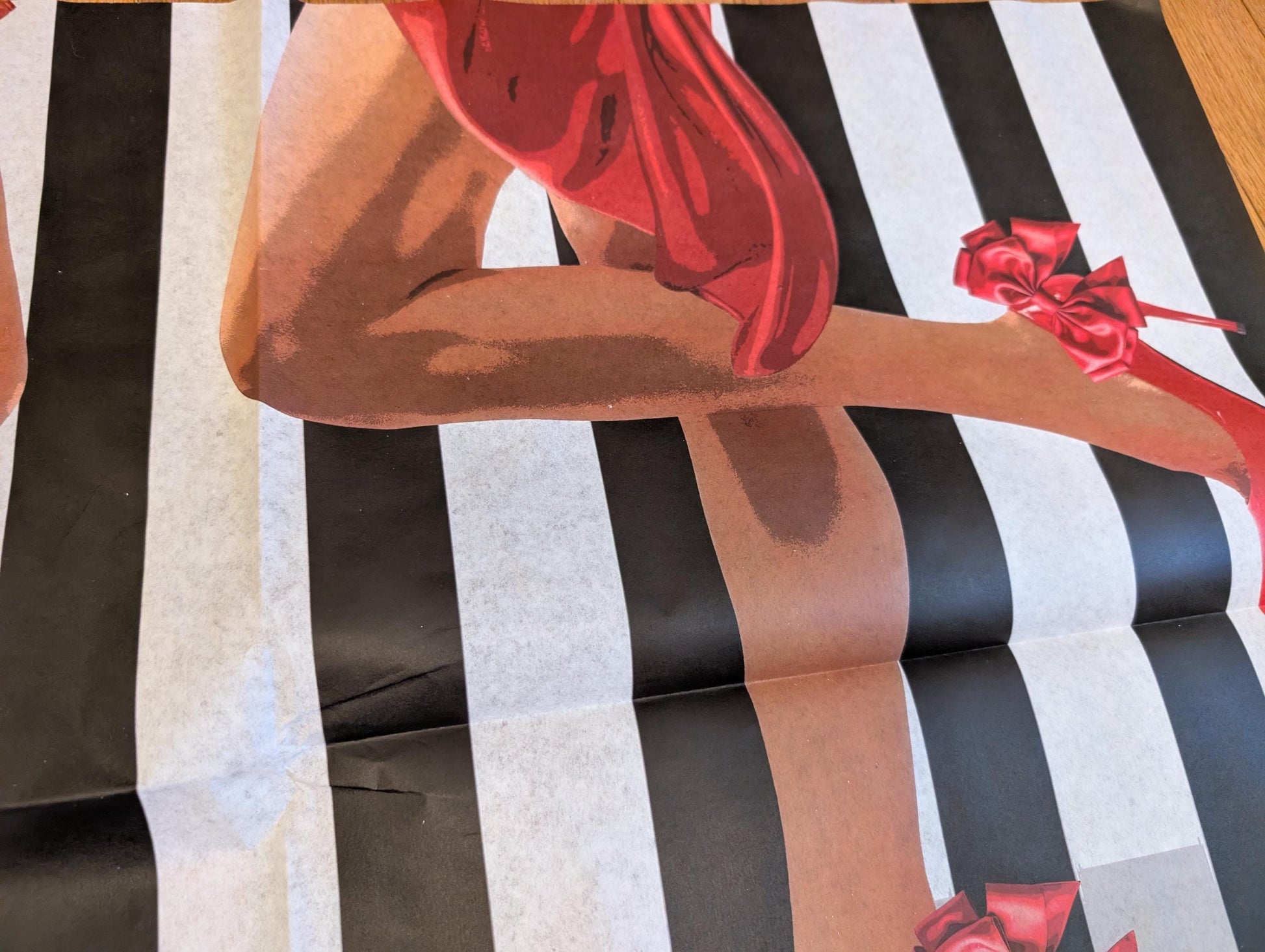 Add a touch of whimsical sophistication to your furniture and crafts with our Funky Decoupage Paper featuring the captivating "Woman in Red Heels" design. Perfect for DIY furniture art, book scrapping, and upcycling, this eye-catching tissue paper combines modern style with playful charm, making every piece uniquely yours. Crafted with high-quality decoupage paper, this design showcases a stylish silhouette of a woman’s legs in striking red high heels, set against a bold striped background.