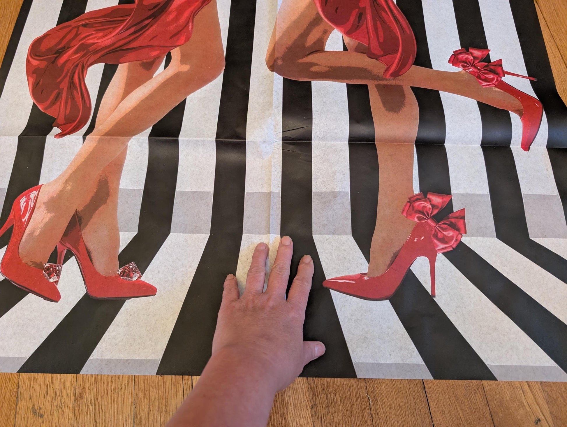 Add a touch of whimsical sophistication to your furniture and crafts with our Funky Decoupage Paper featuring the captivating "Woman in Red Heels" design. Perfect for DIY furniture art, book scrapping, and upcycling, this eye-catching tissue paper combines modern style with playful charm, making every piece uniquely yours. Crafted with high-quality decoupage paper, this design showcases a stylish silhouette of a woman’s legs in striking red high heels, set against a bold striped background.