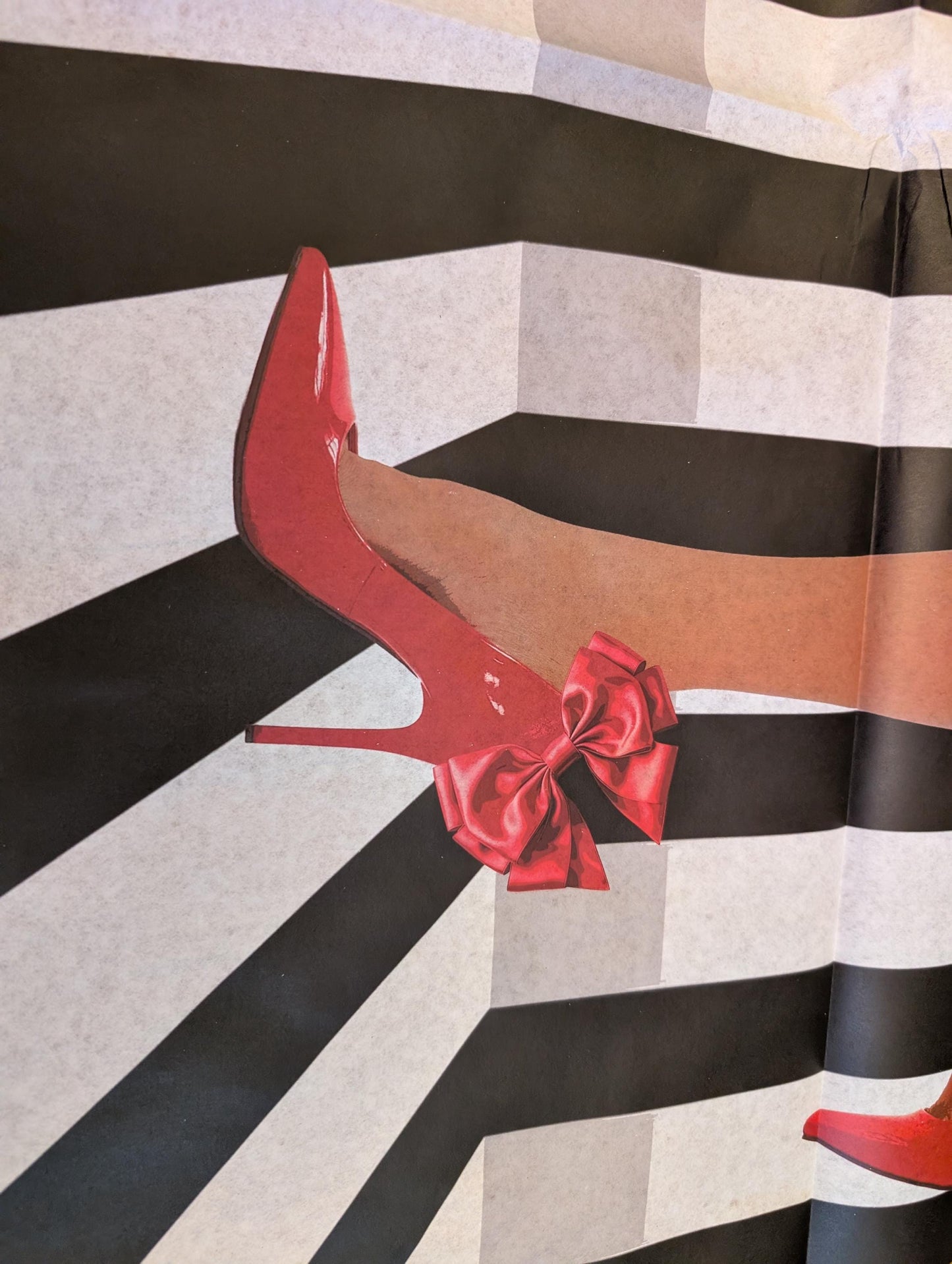 Add a touch of whimsical sophistication to your furniture and crafts with our Funky Decoupage Paper featuring the captivating "Woman in Red Heels" design. Perfect for DIY furniture art, book scrapping, and upcycling, this eye-catching tissue paper combines modern style with playful charm, making every piece uniquely yours. Crafted with high-quality decoupage paper, this design showcases a stylish silhouette of a woman’s legs in striking red high heels, set against a bold striped background.