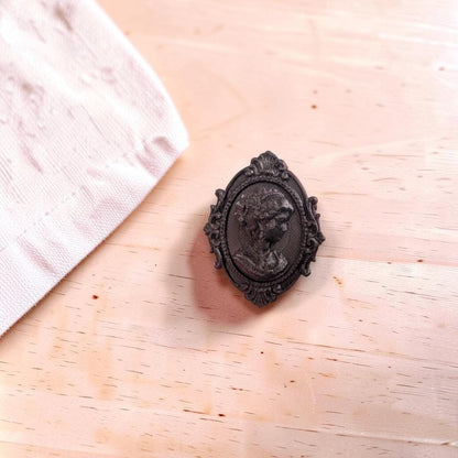 Add a touch of gothic elegance to your furniture with this stunning 3D-printed Cameo Cabinet Drawer Pull. Designed to elevate your cabinetry, this drawer knob combines vintage charm with modern craftsmanship, making it perfect for furniture hardware, wardrobe handles, kitchen hardware, and bathroom remodels. Crafted with attention to detail, this gothic-inspired drawer pull features intricate carved accents that evoke a sense of timeless sophistication.