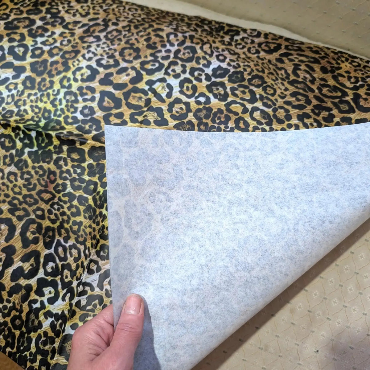 Stunning animal print decoupage paper featuring a bold leopard design. Perfect for furniture upcycling, home remolding, and craft enthusiasts, this tissue paper adds a touch of wild elegance to any surface. 