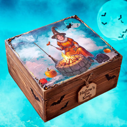 A wooden trunk upcycled with a decoupaged image of Halloween witch grilling hot dogs on afire pit